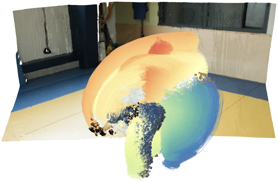 An indoor scene reconstructed with colored 3D motion tracks.